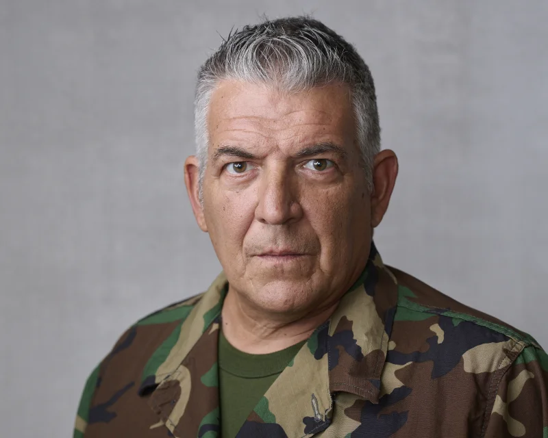 SAG actor in camouflage jacket for a military character acting headshot in Phoenix Arizona