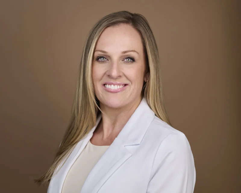 A natural, confident professional headshot of Amanda Lorenz photographed by Marie Feutrier