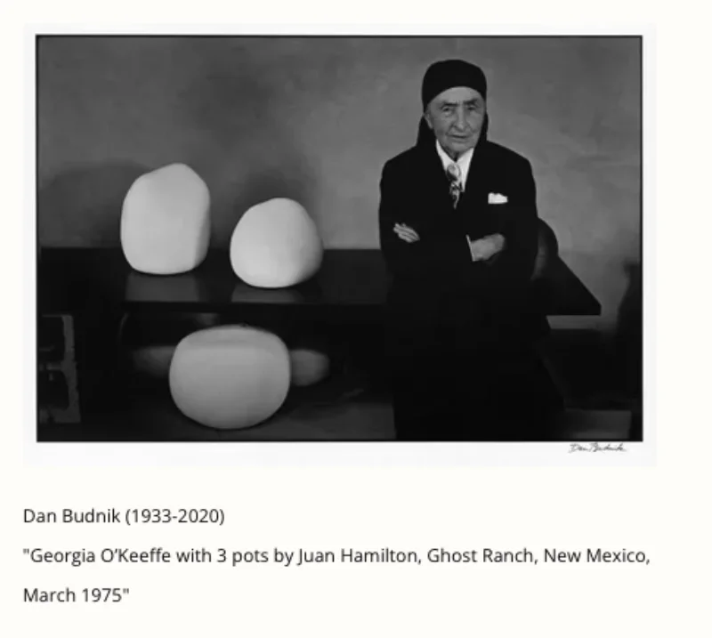 Georgia O'Keeffe with 3 pots by Juan Hamilton at Ghost Ranch, New Mexico, March 1975 — portrait by Dan Budnik