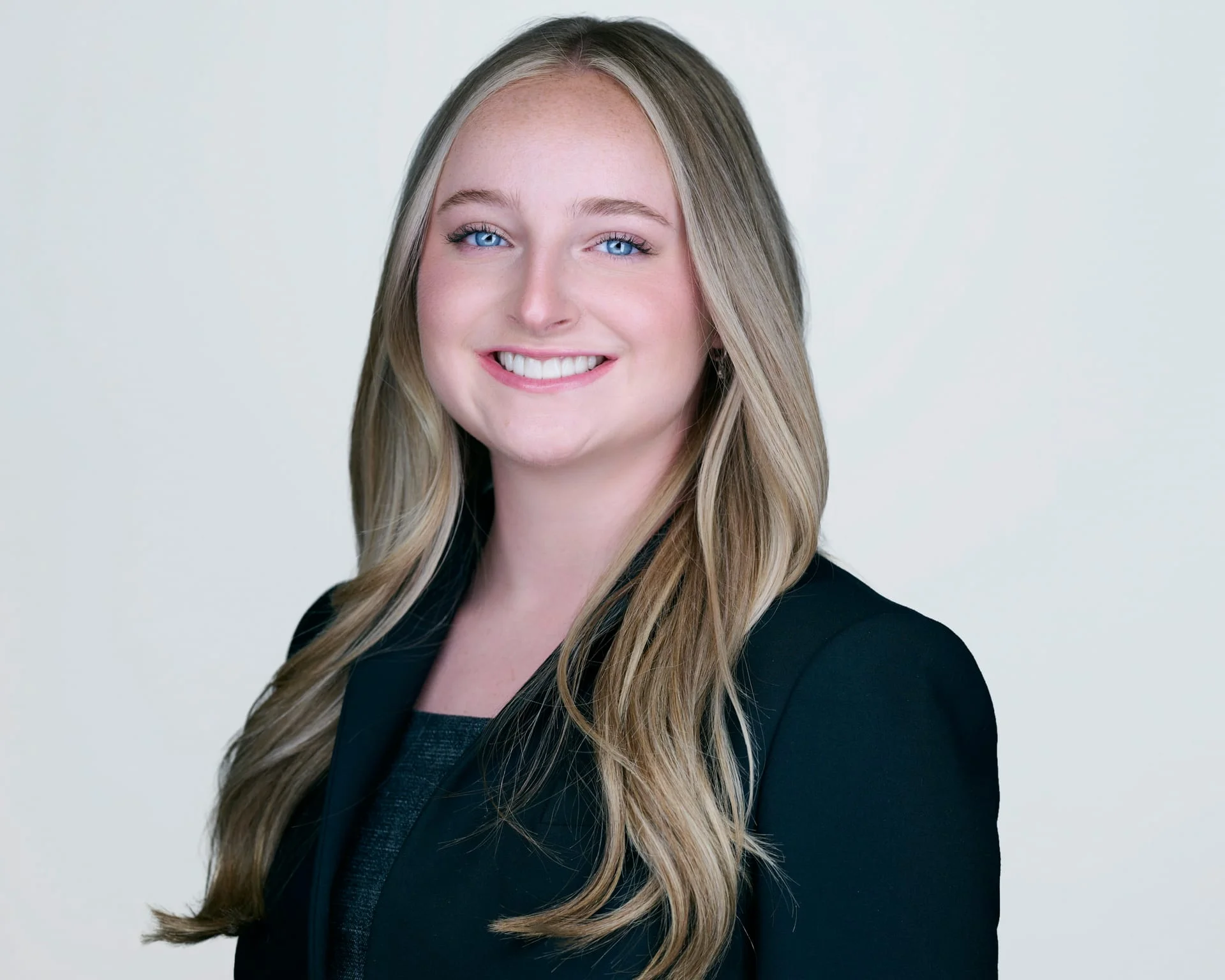 ERAS headshot of female medical student in black blazer with warm smile for residency application Phoenix Arizona