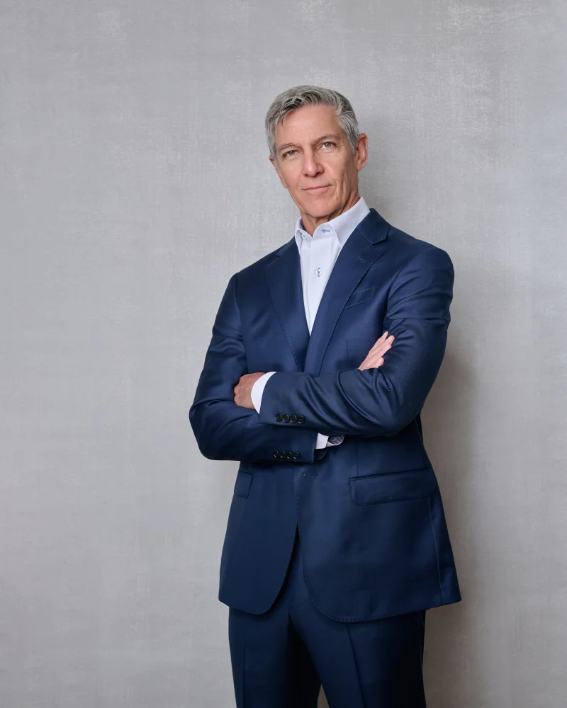 Executive headshot of professional man in navy suit Phoenix Arizona