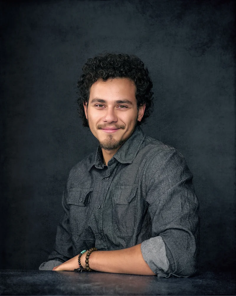 Elias, podcast host warm approachable portrait for guest outreach by Marie Feutrier